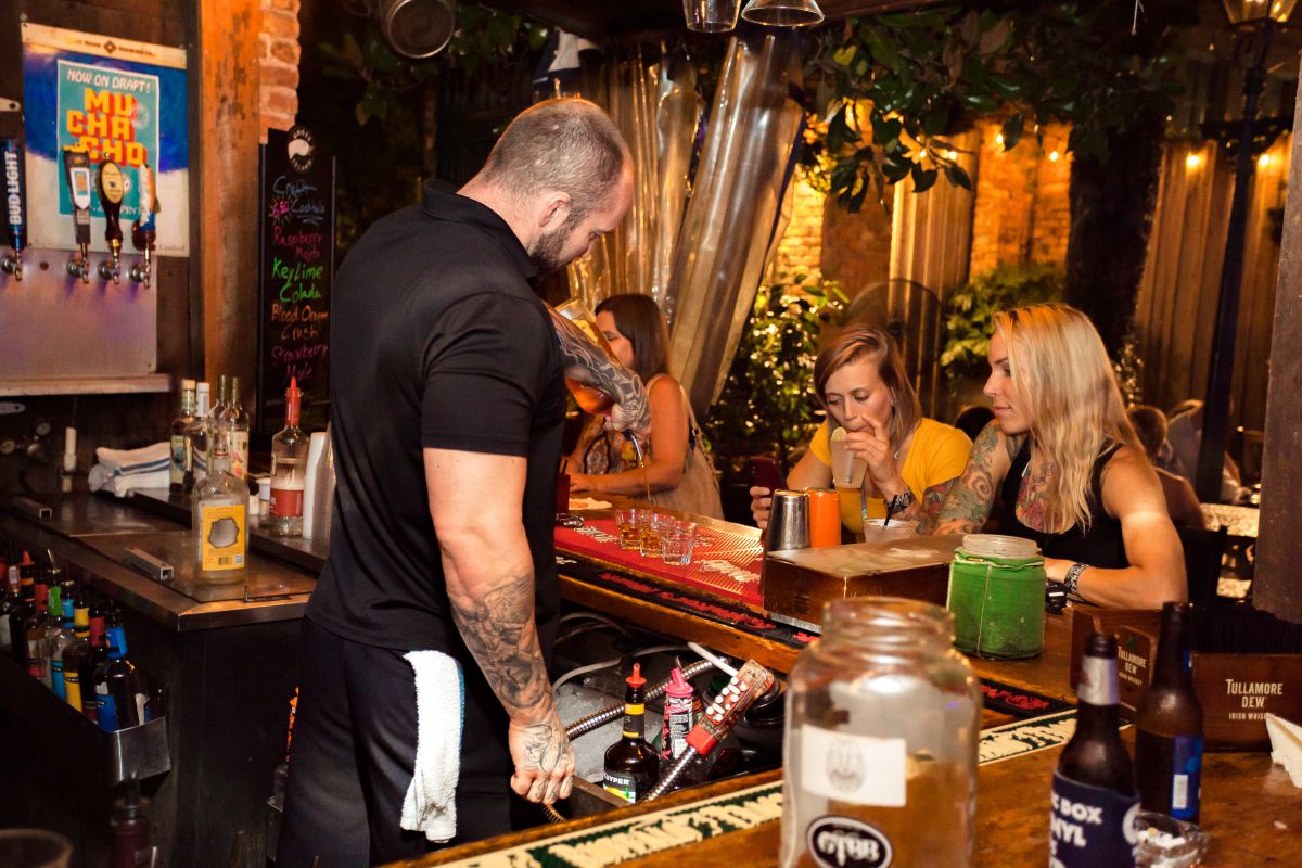 Seville Quarter - Bartender Serves Drinks