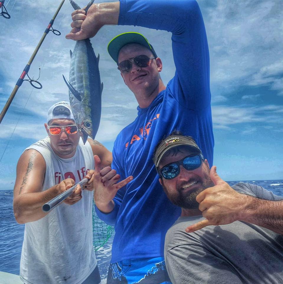 3 Vets showing off sport fish catch