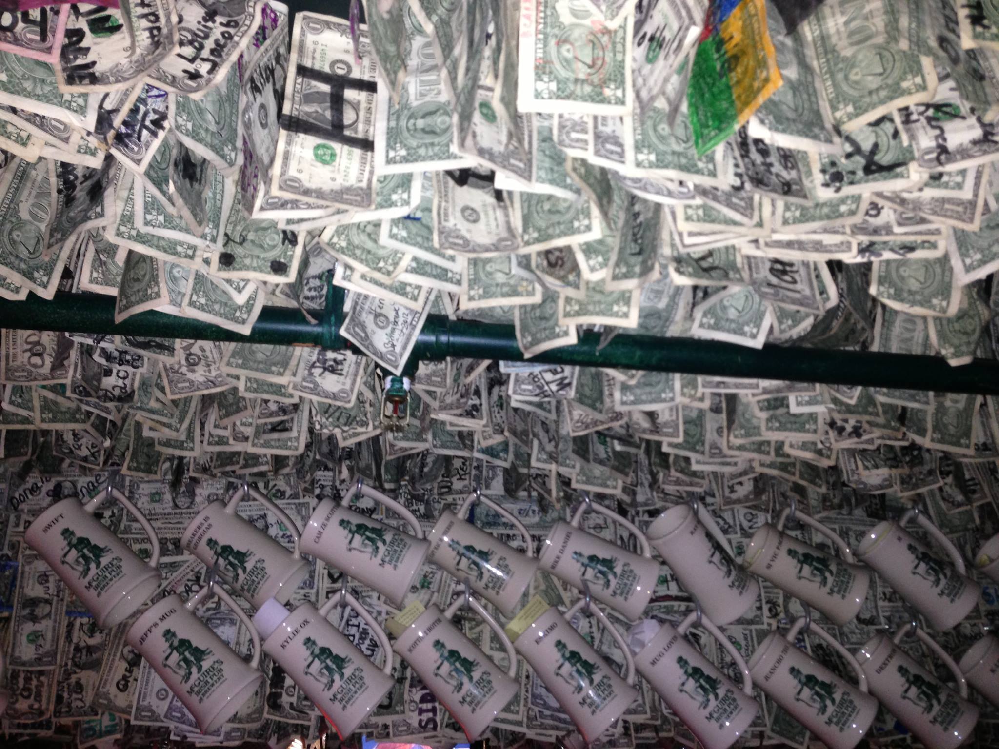 Money and Mugs hanging from the ceiling at McGuires Pensacola