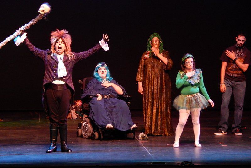 an image of a group of people on stage performing