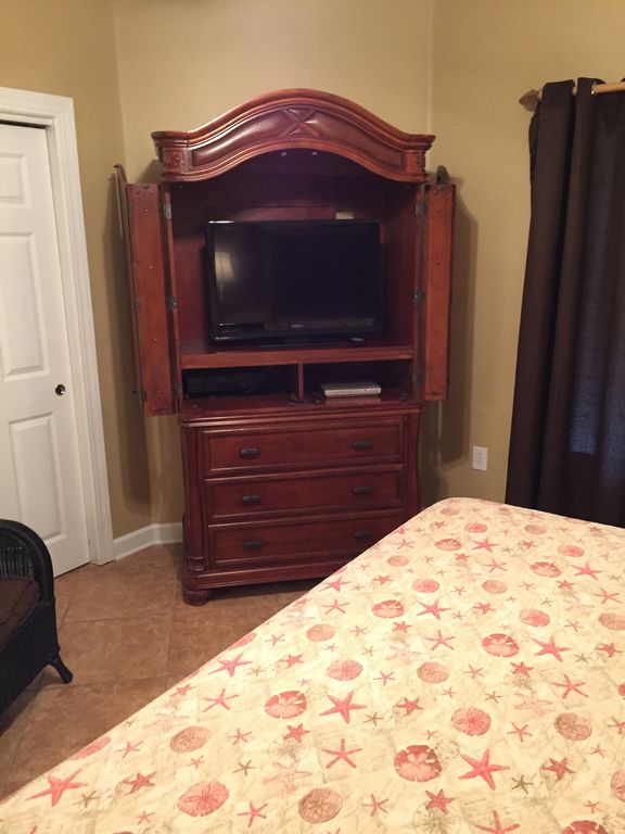 Guest Bedroom with Large HDTV & DVD
