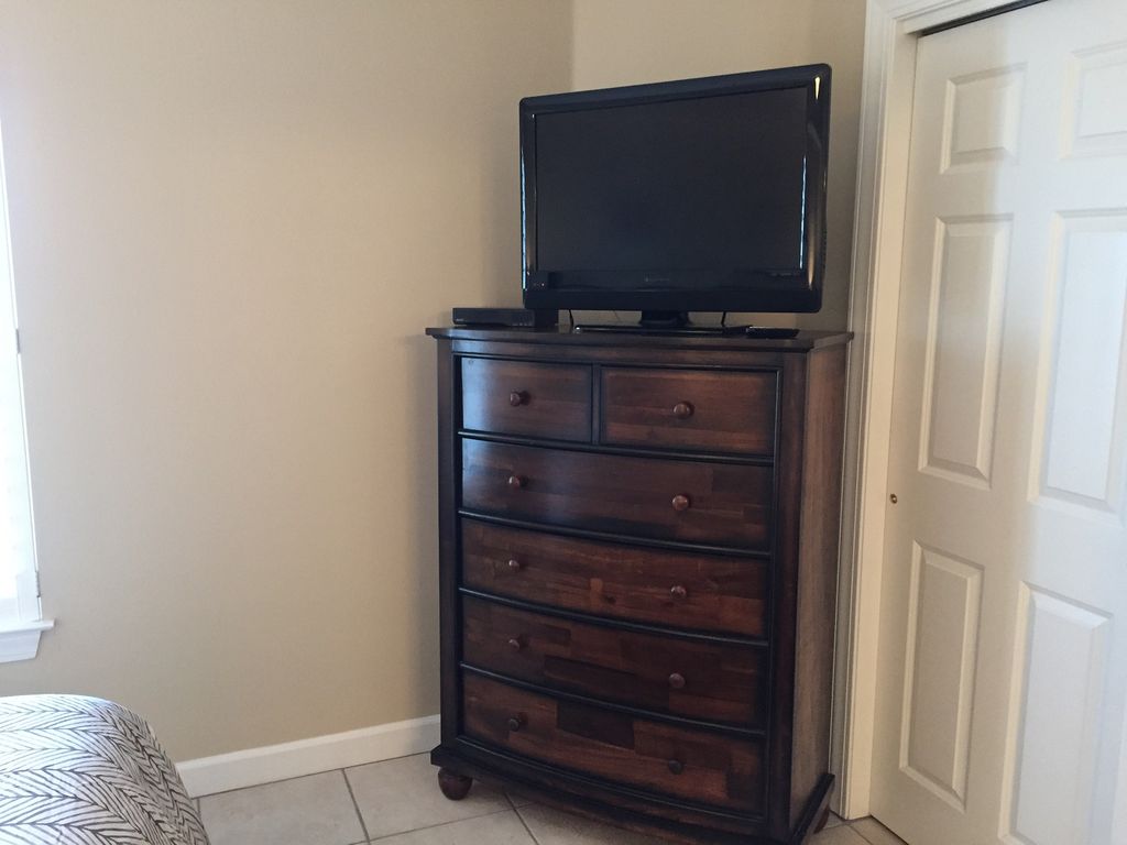 Guest bedroom with HDTV and DVD