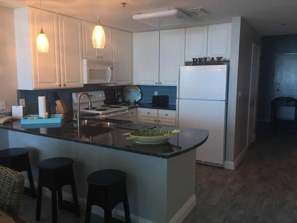 Large spacious Fully Stocked Kitchen with Breakfast Bar