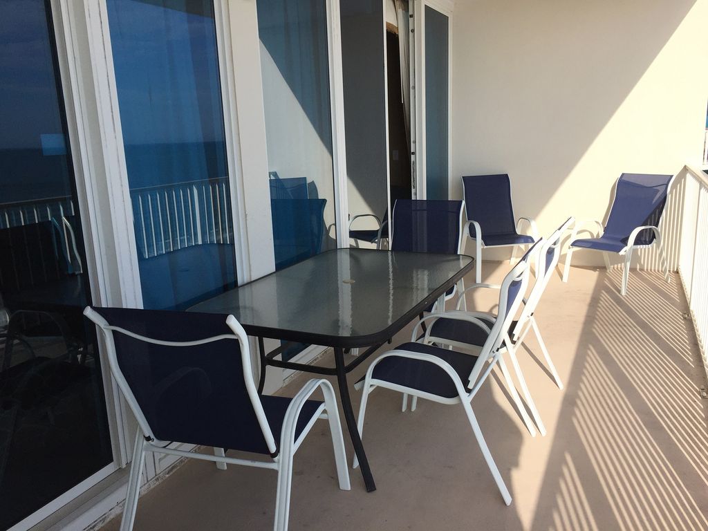 Spacious Balcony with Table and 6 chiars and Lounger