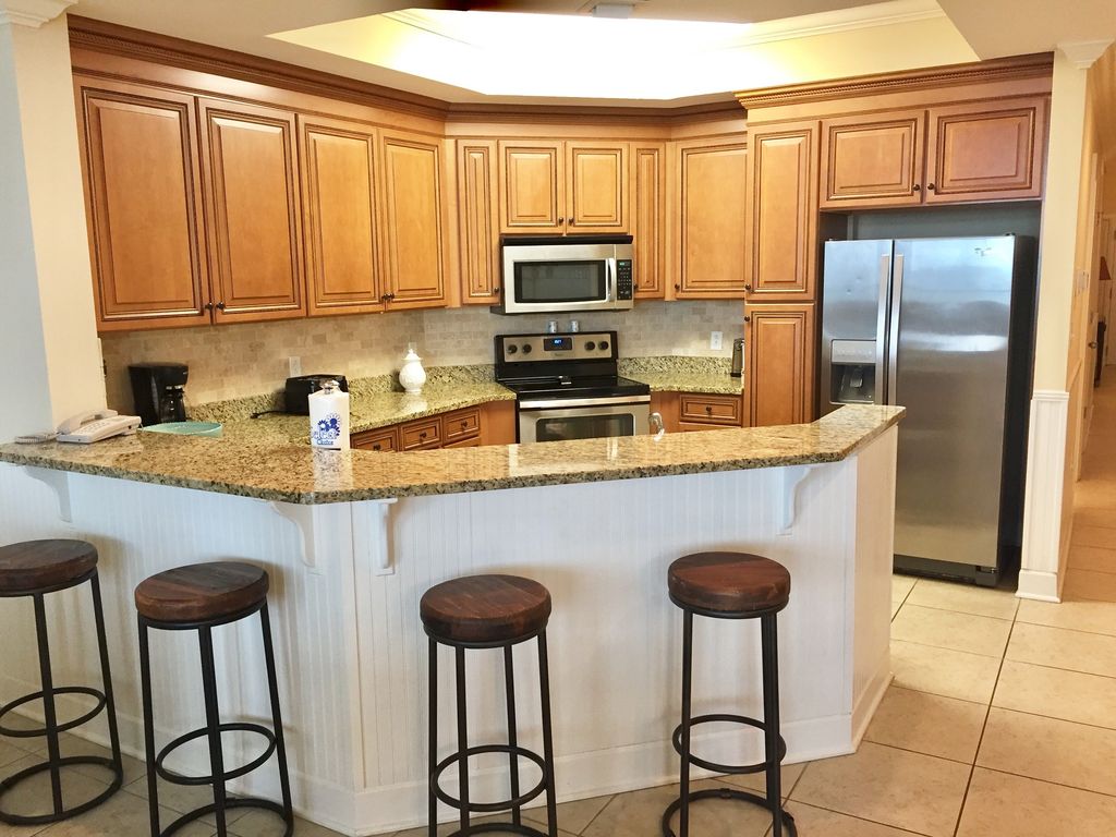 Fully Stocked Kitchen with Breakfast Bar