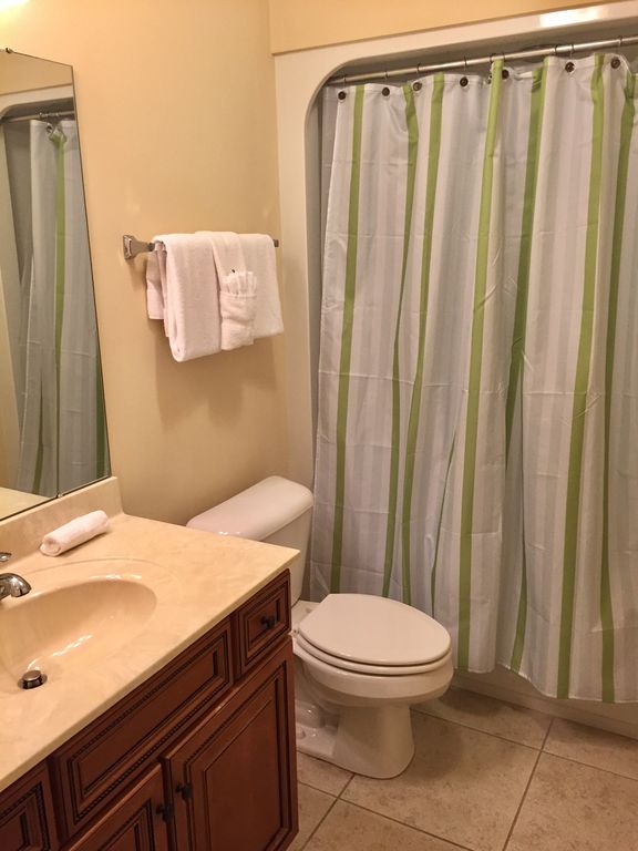 Guest Bath with Tub Shower Combo. (In each guest bedroom)