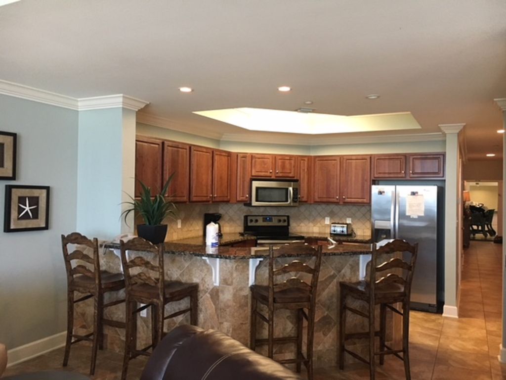 Fully Stocked Kitchen with Breakfast Bar & Seating for 4