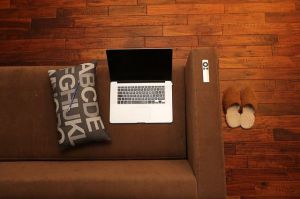 image of a couch with laptop