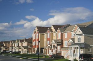 image of a row of single family homes in a neighborhood