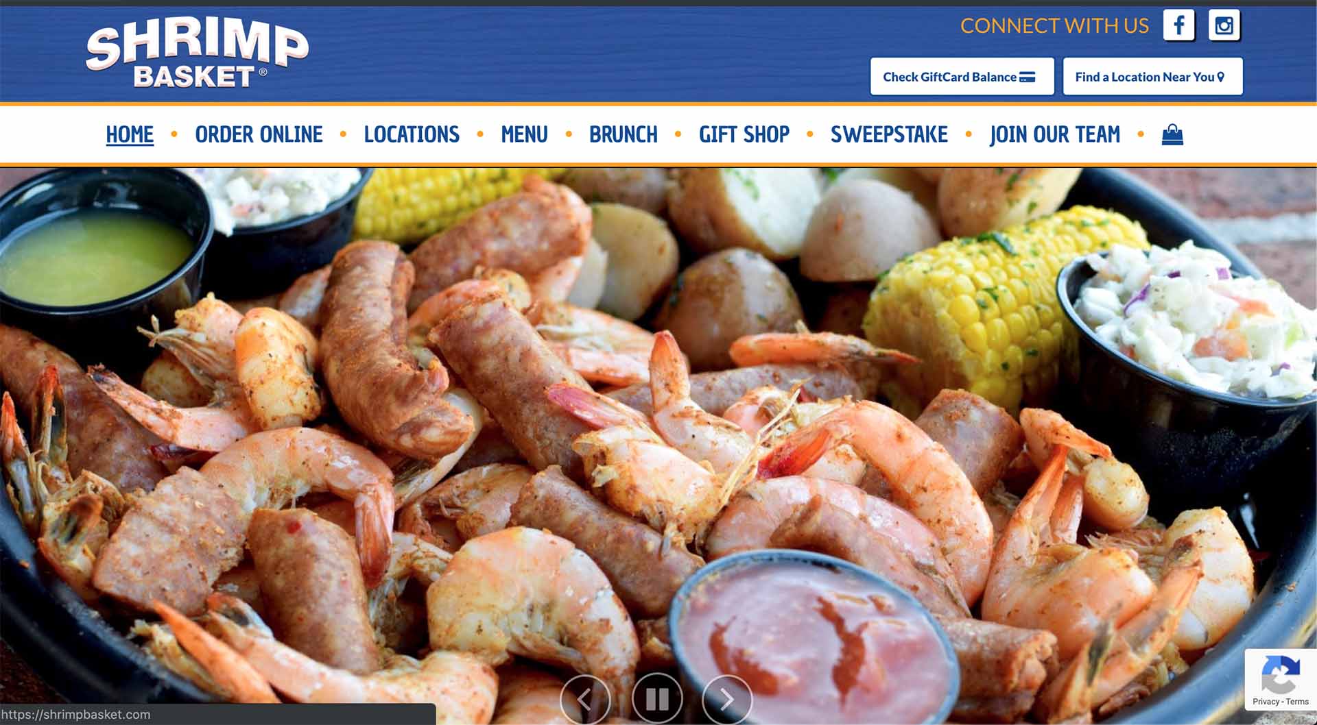 an image of Shrimpbasket.com's home page of the website with boiled shrimp