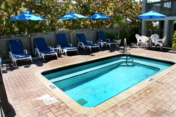 Pool Area With Chaise Lounges
