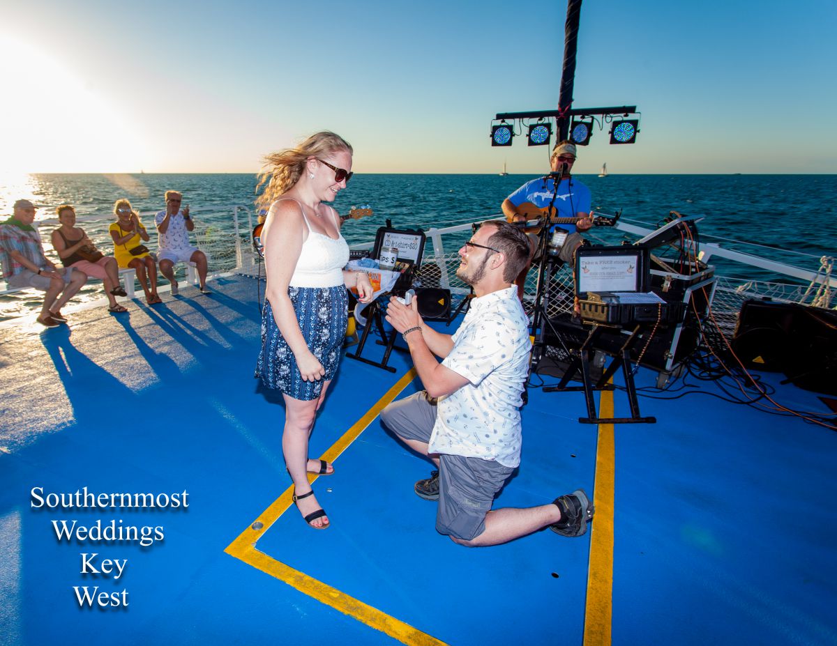 Surprise Engagement on a Sailboat by Southernmost Weddings Key West