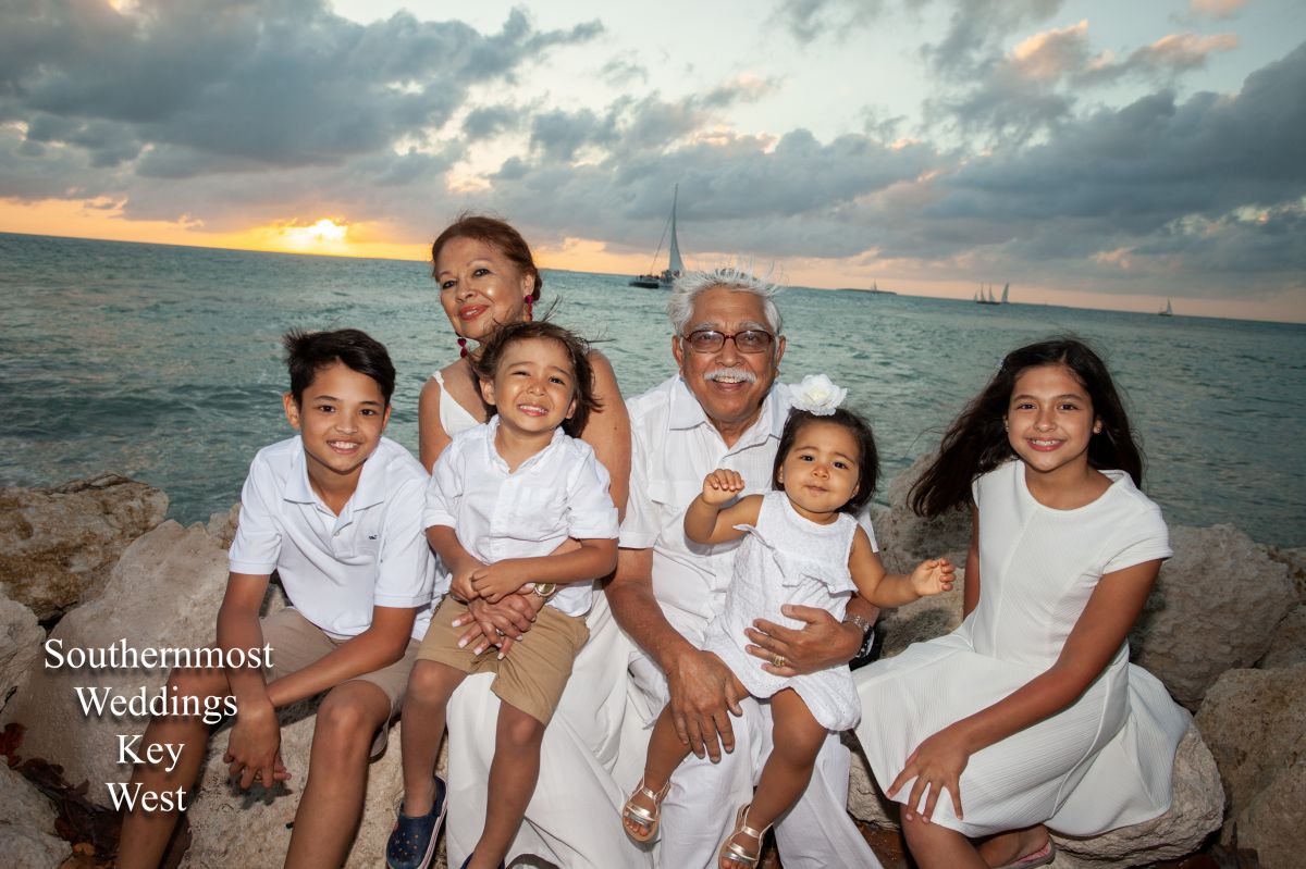 Grandparents and their Grandchildren pose for Family Photos at Ft. Zachary Taylor by Southernmost Weddings Key West