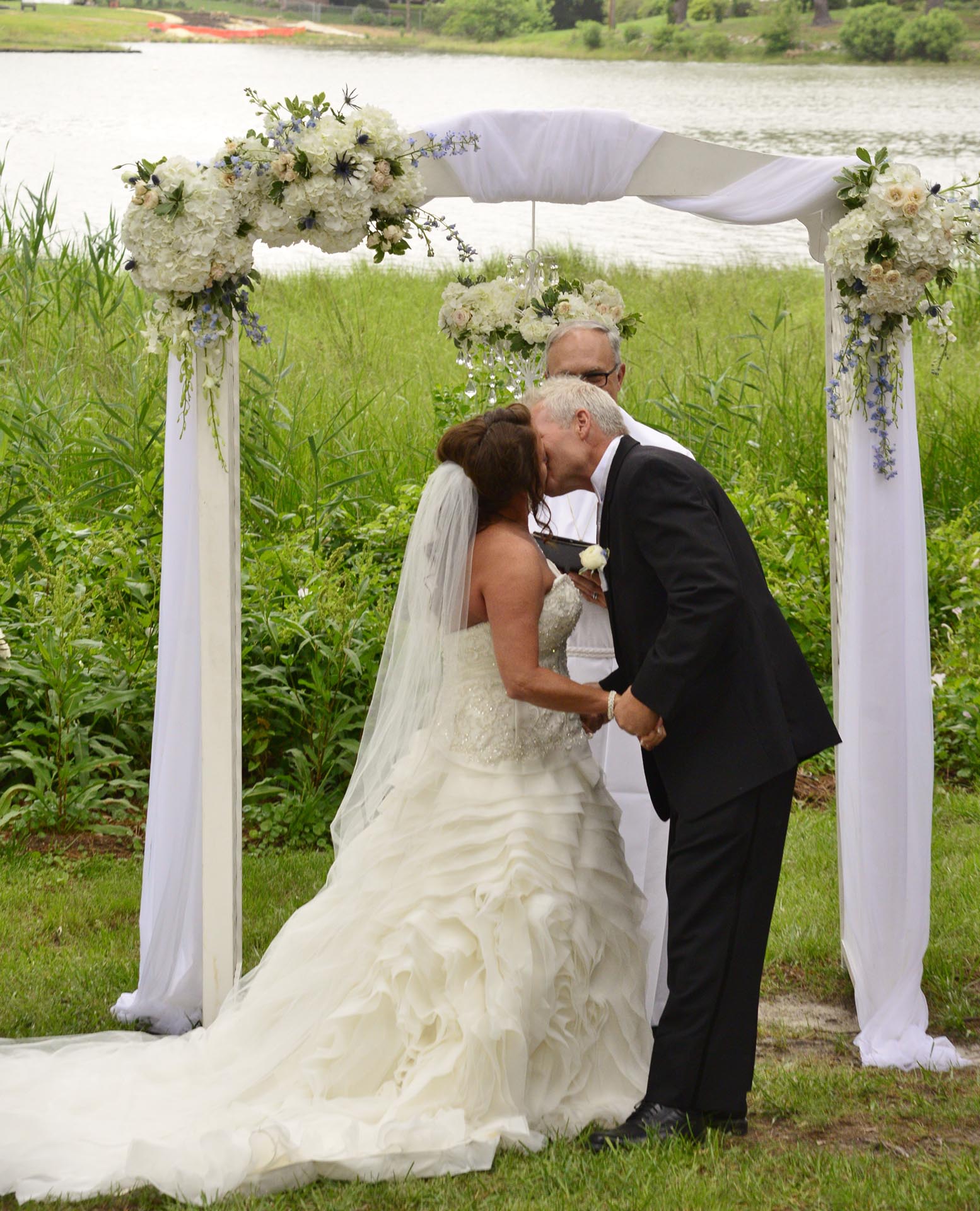 Bride and groom kissing 