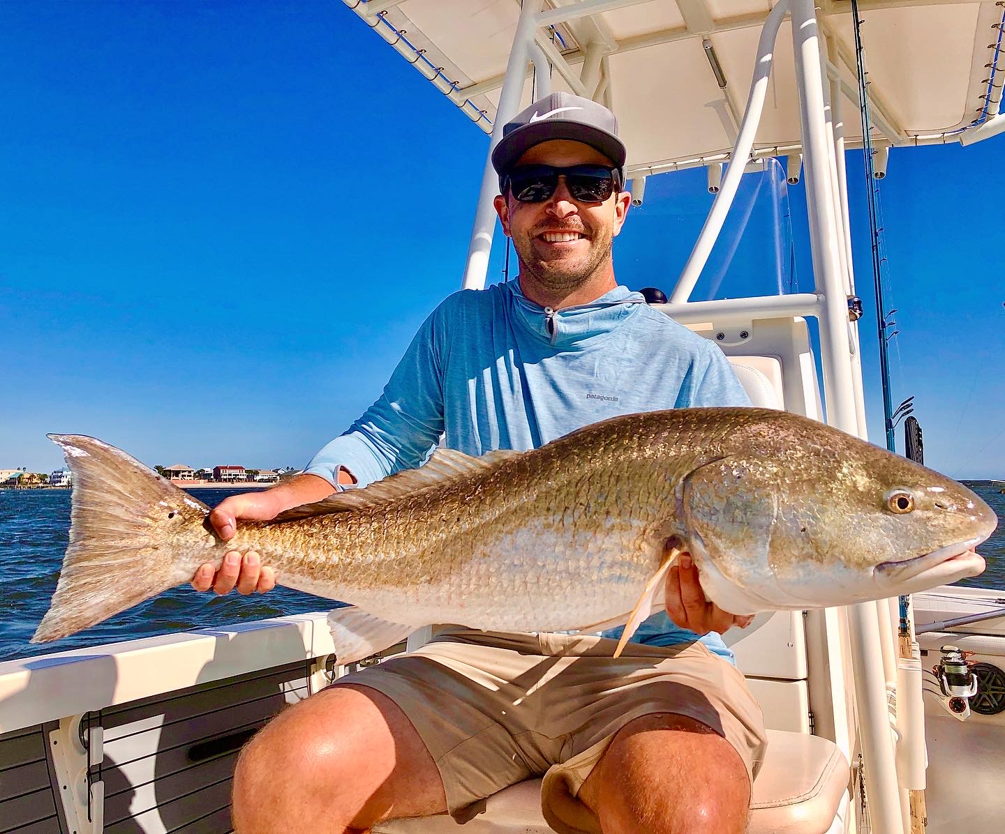 A man holding a Redfish