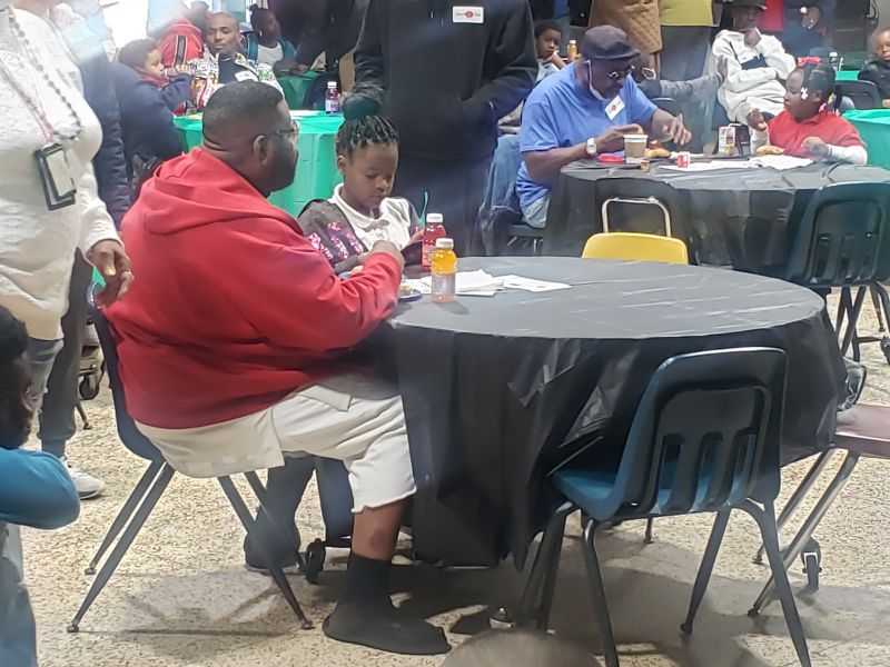 Dads and father figures showed up in large numbers at Montclair Elementary's Donuts with Dads event.