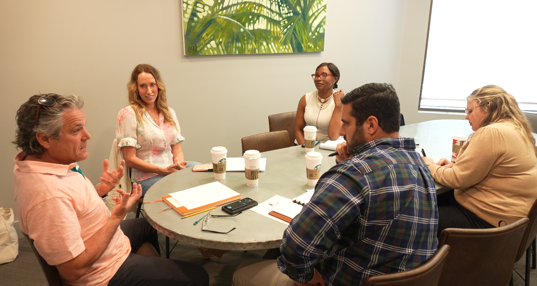 VMS mentees Stelios and Cristin Peterson get advice from mentors Buddy Cummings, Nikki Cummings, and Jessica Griffen.