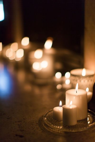 lit candles at a wedding ceremony