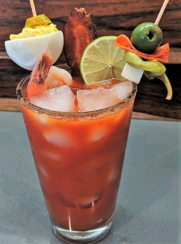 'Big Mama' Mary Tavern Mary with Blue Cheese Olive, Pecan Wood Smoked Bacon, Chilled Shrimp, Pepperoni, Jack Cheese, Pepperoncini, topped with our signature Jalapeño Deviled Egg