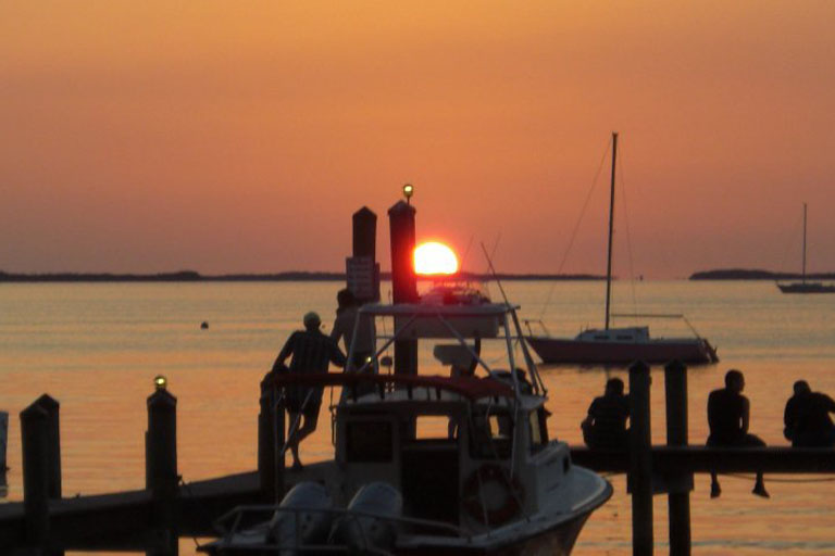 Sun setting over Boat