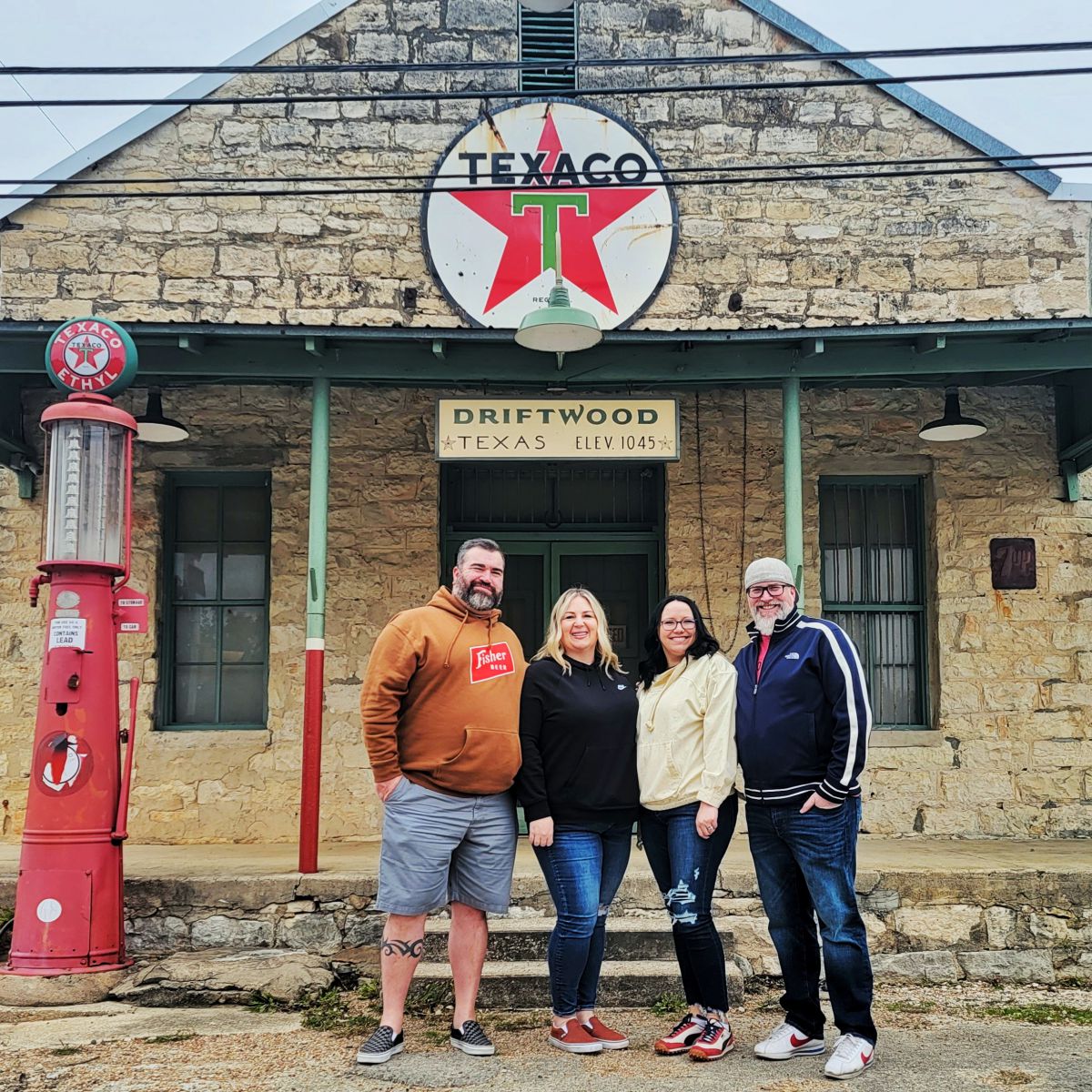 4 people standing in front of Texas country store