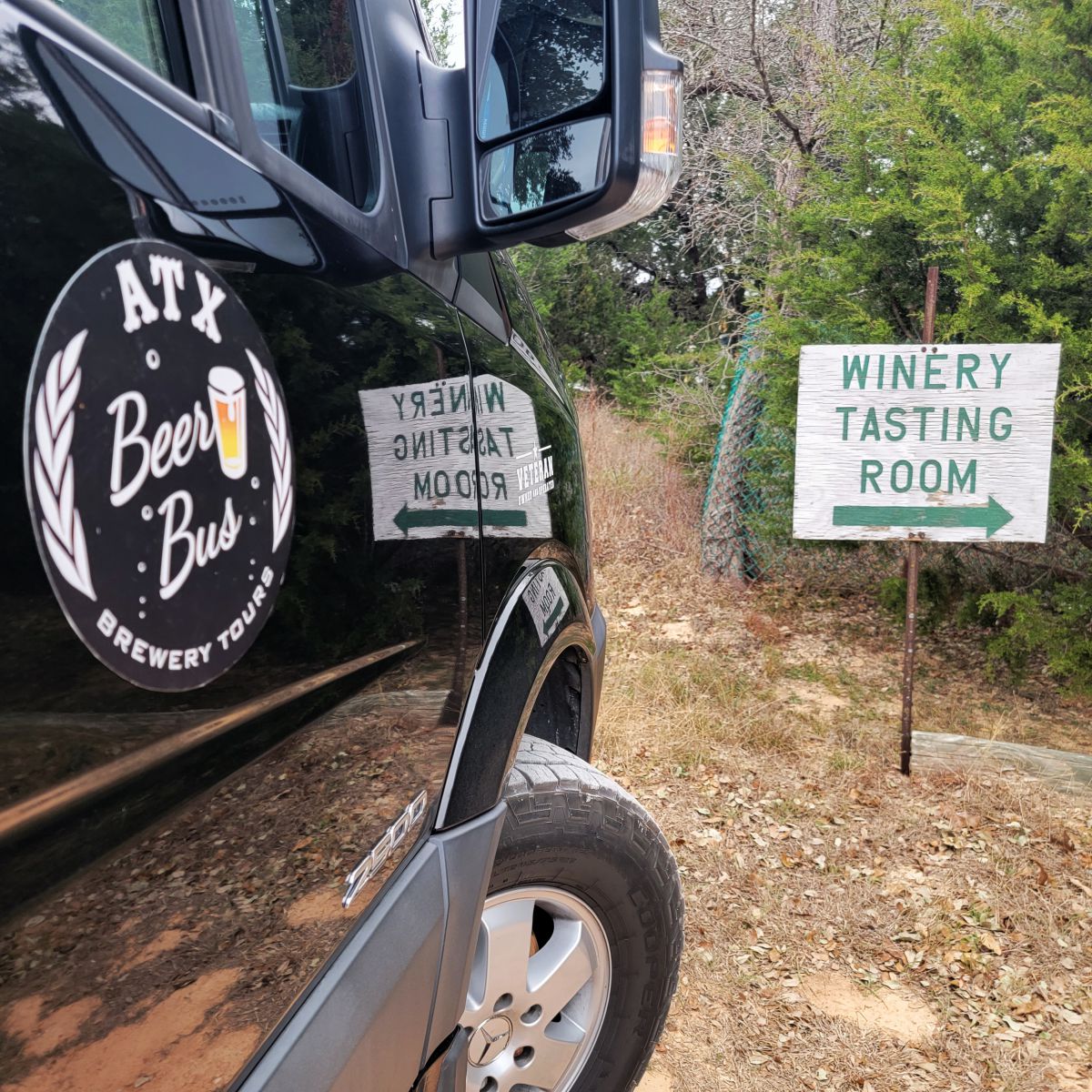ATX Beer Bus in front of winery tasting room sign