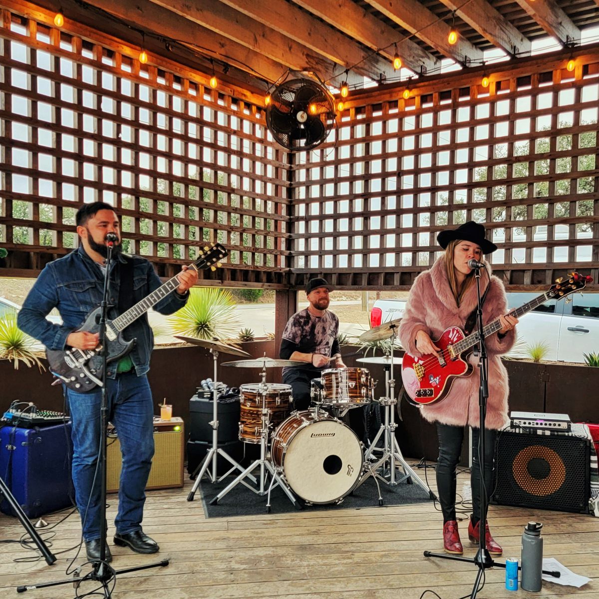 3 piece blues band onstage at distillery