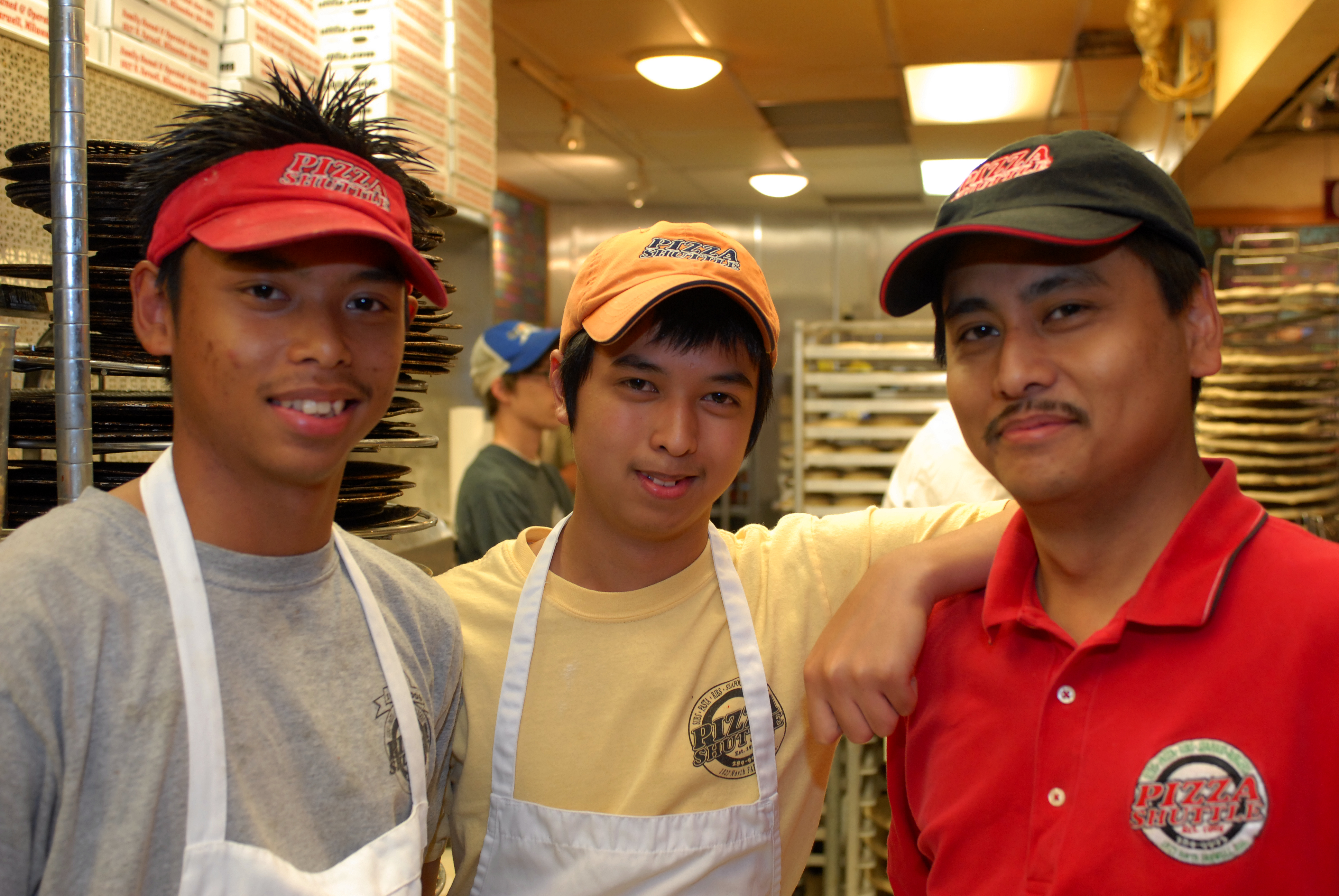 Pizza Shuttle crew prepared to make your order fresh image