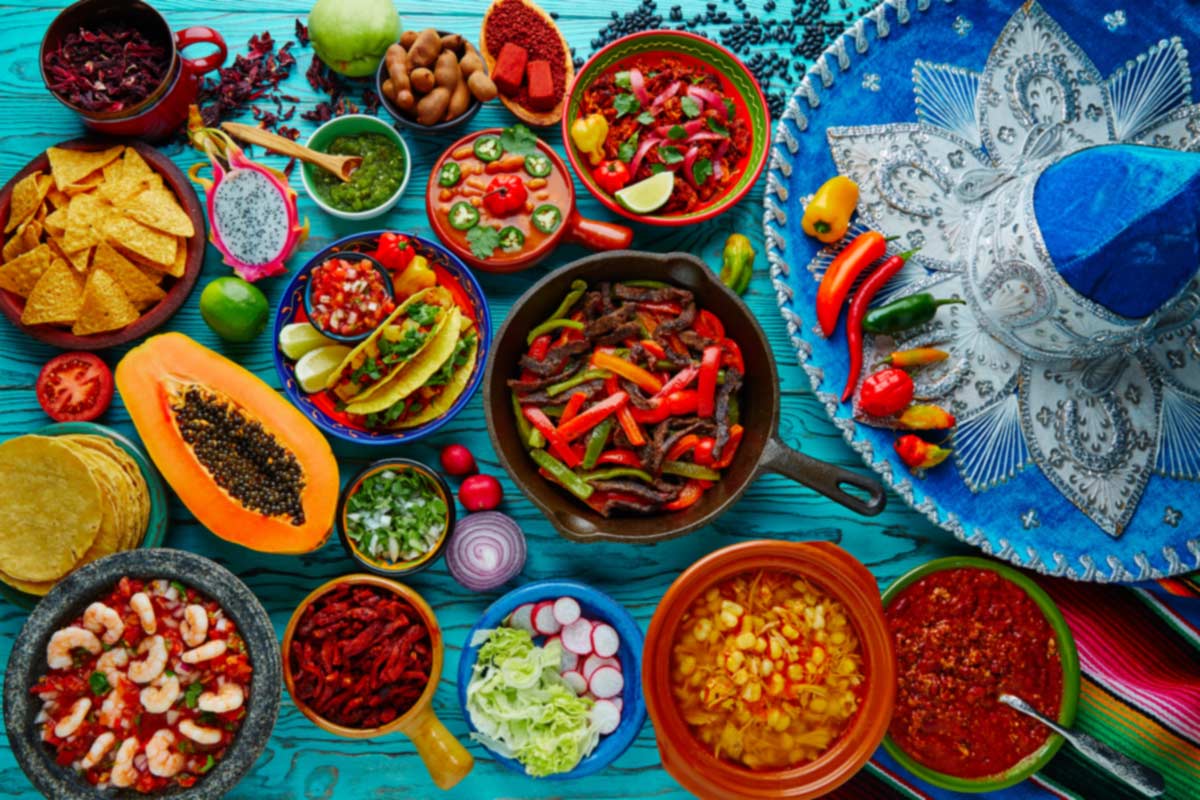 a colorful display of several mexican dishes available at Fuego