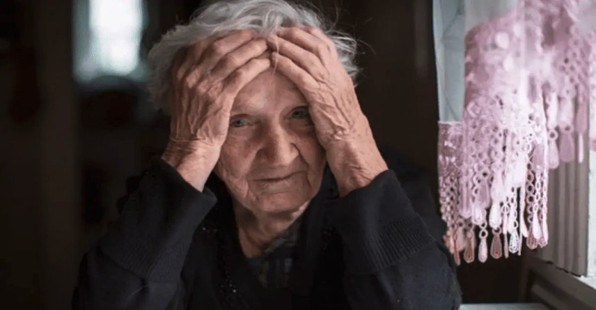 Image of elderly woman depicting misfortune